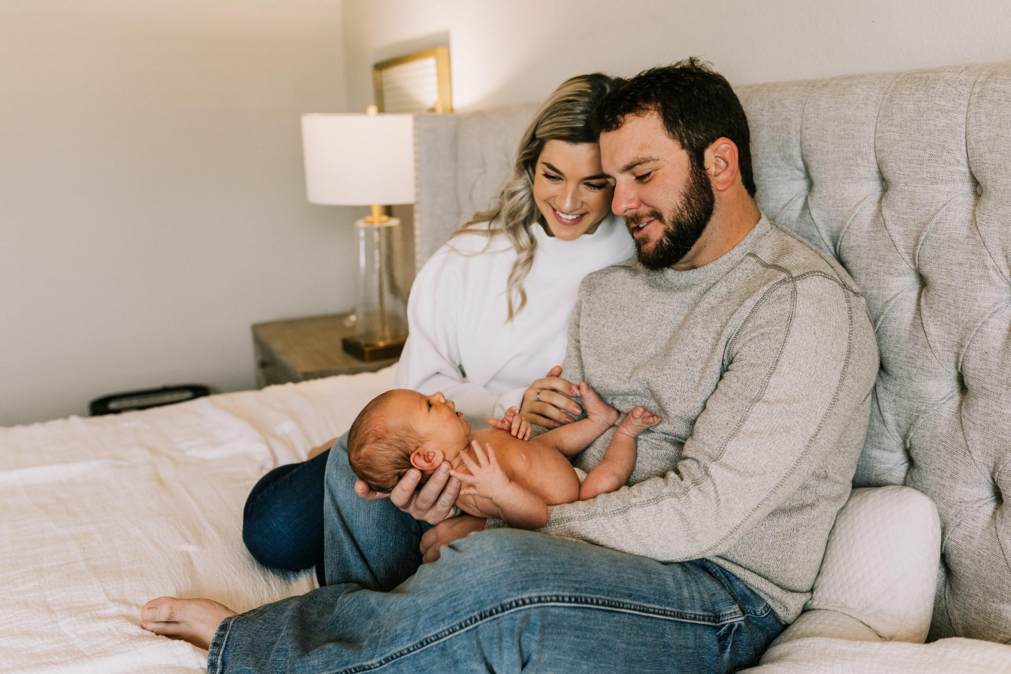 Couple holding a baby